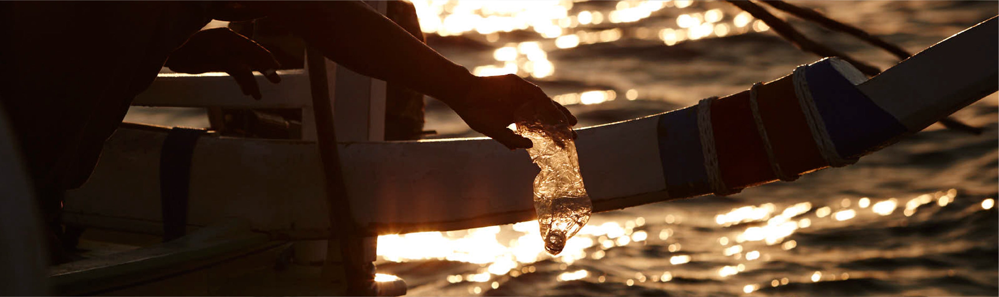 Fisherman Collecting plastic from the see