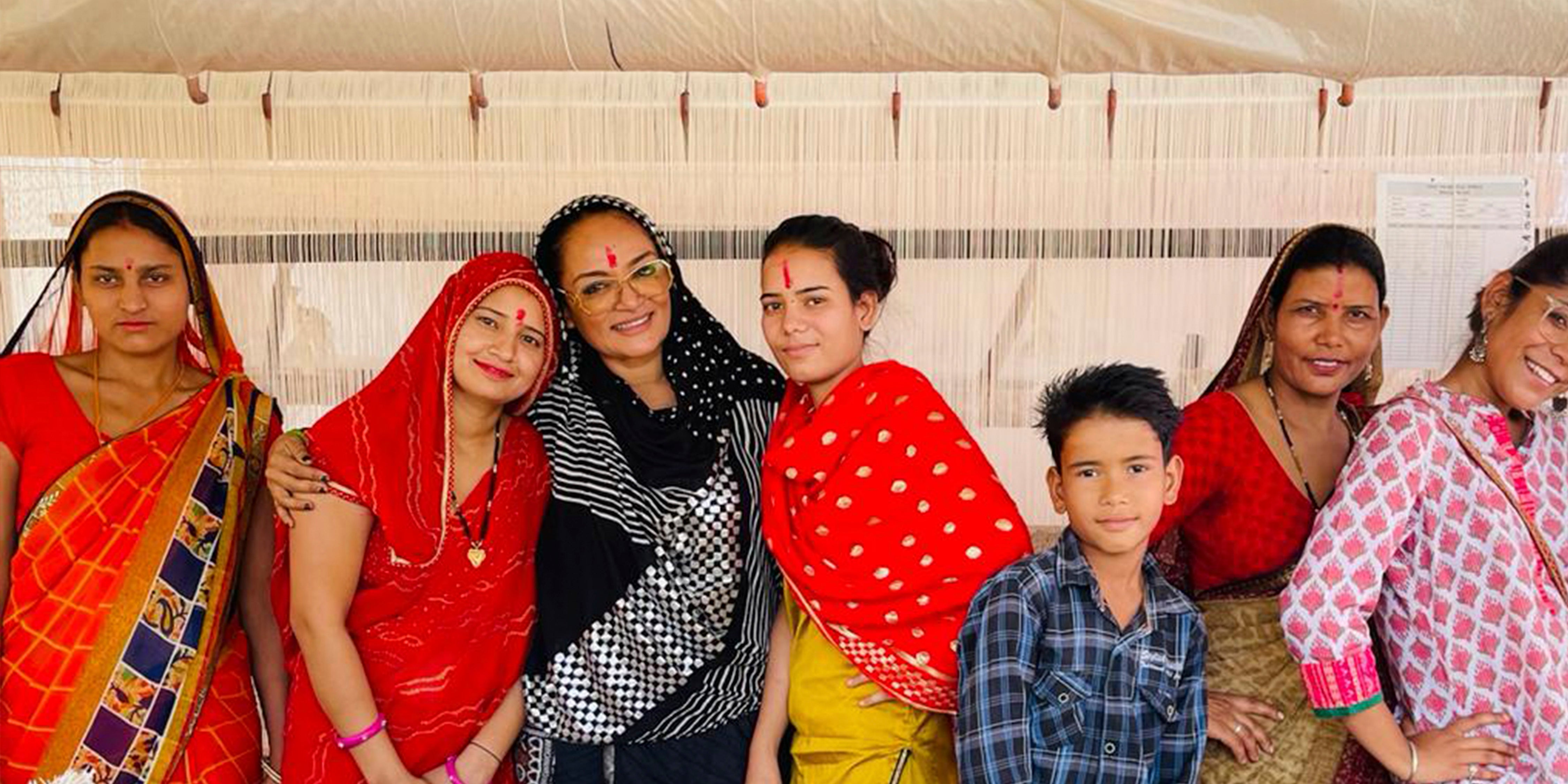 Former VOGUE India Editor Bandana Tewari with a group of women in India