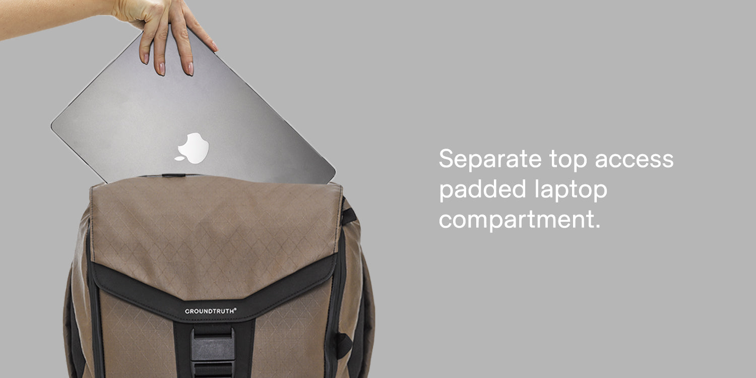 Separate top access padded laptop compartment 