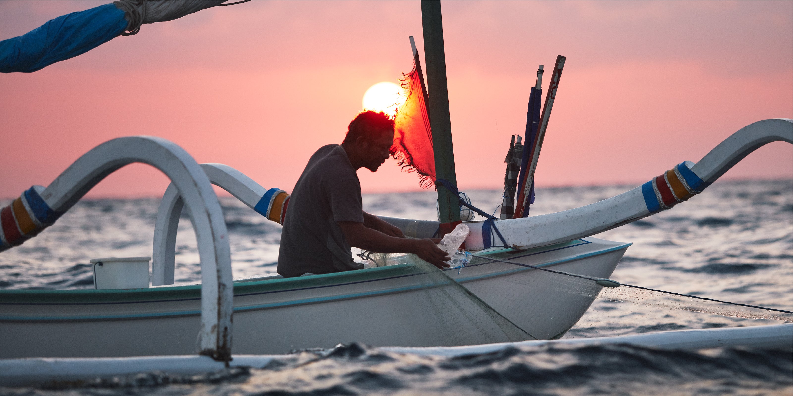 Groundtruth - Fishing man finding a plastic during fishing in the sea