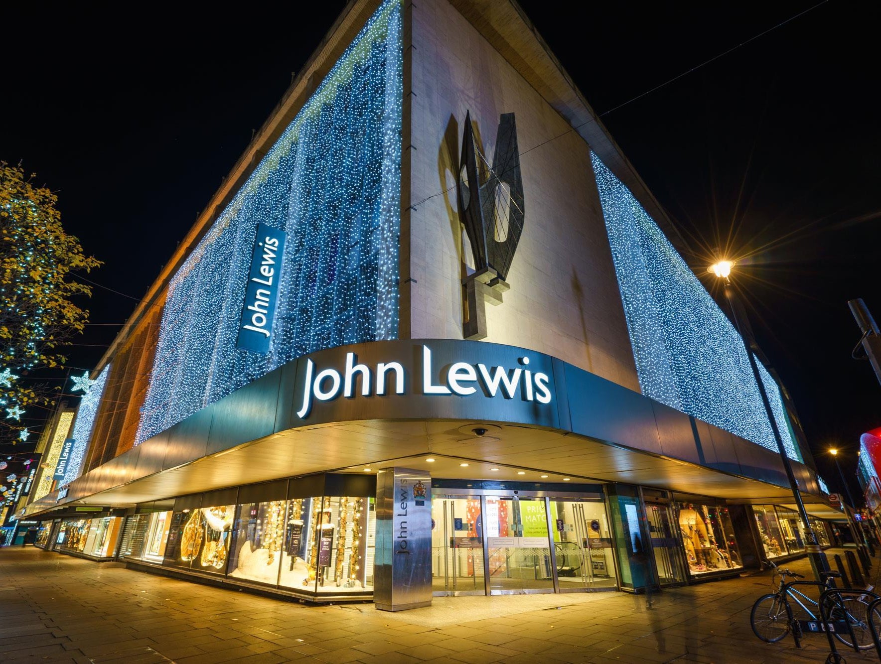 John Lewis store exterior at night with illuminated facade