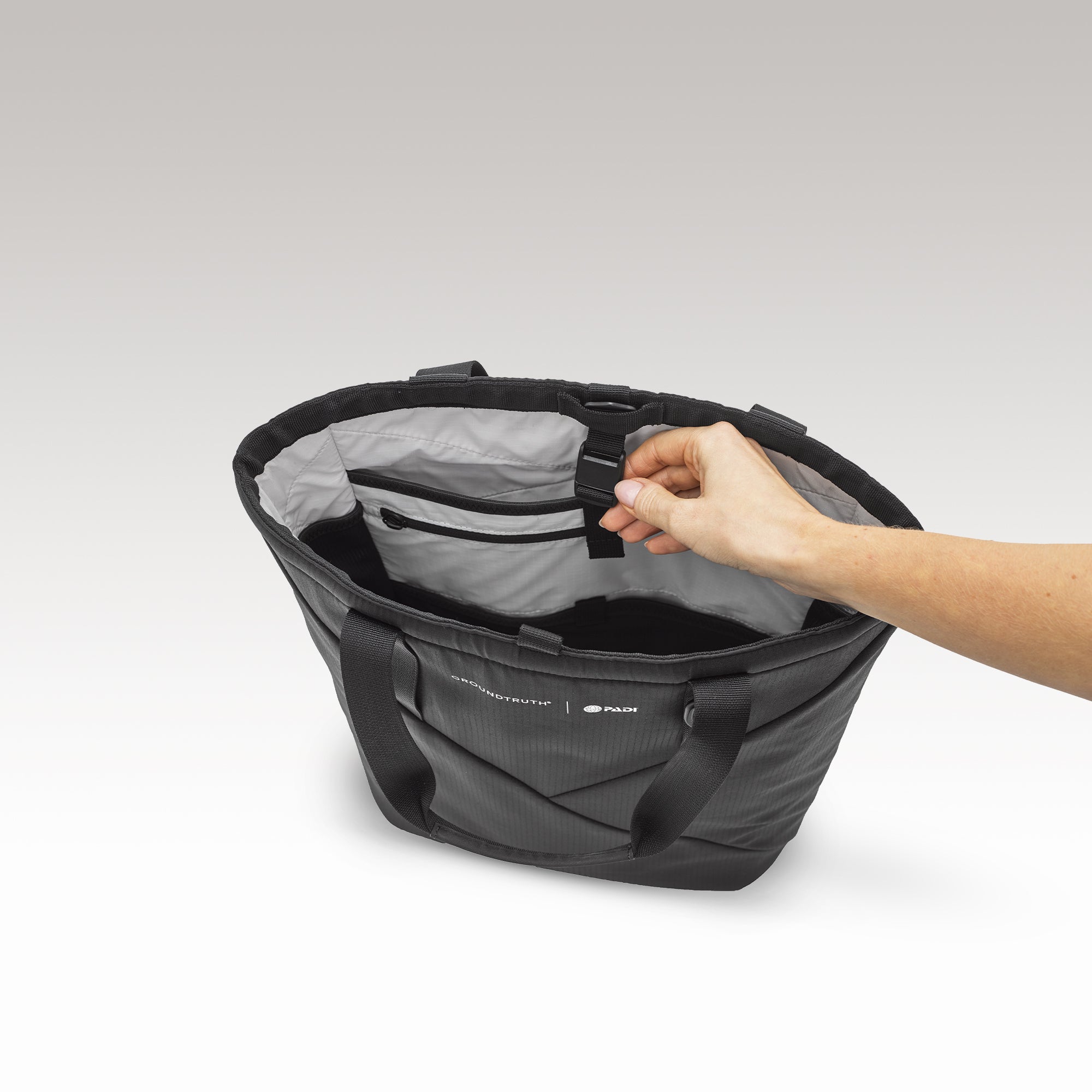 The Day Tote insert fits in the 25L UNDA backpack with 15" Laptop compartment 